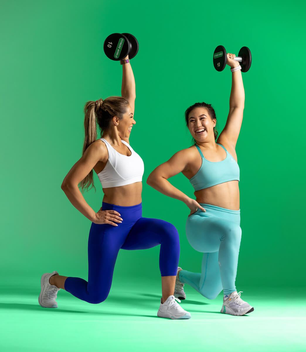 two women lifting weights
